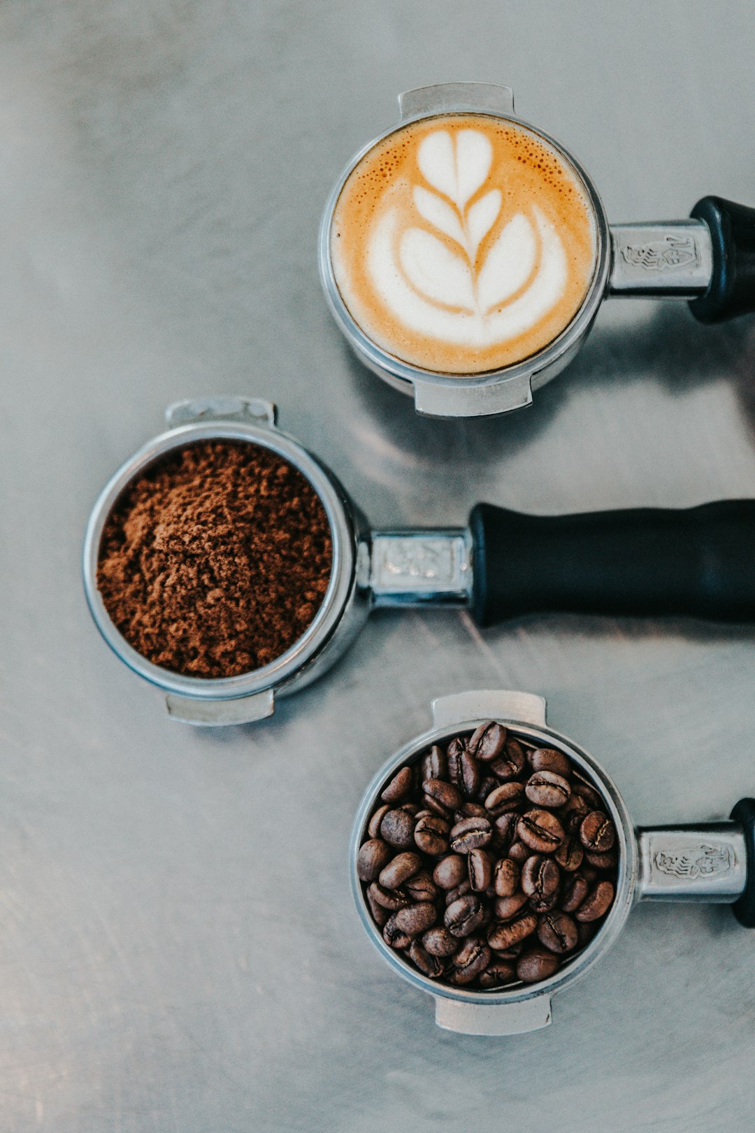 flat-lay-photography-of-coffee-latte-ground-coffee-and-coffee-beans-y3aqmbmtlqi